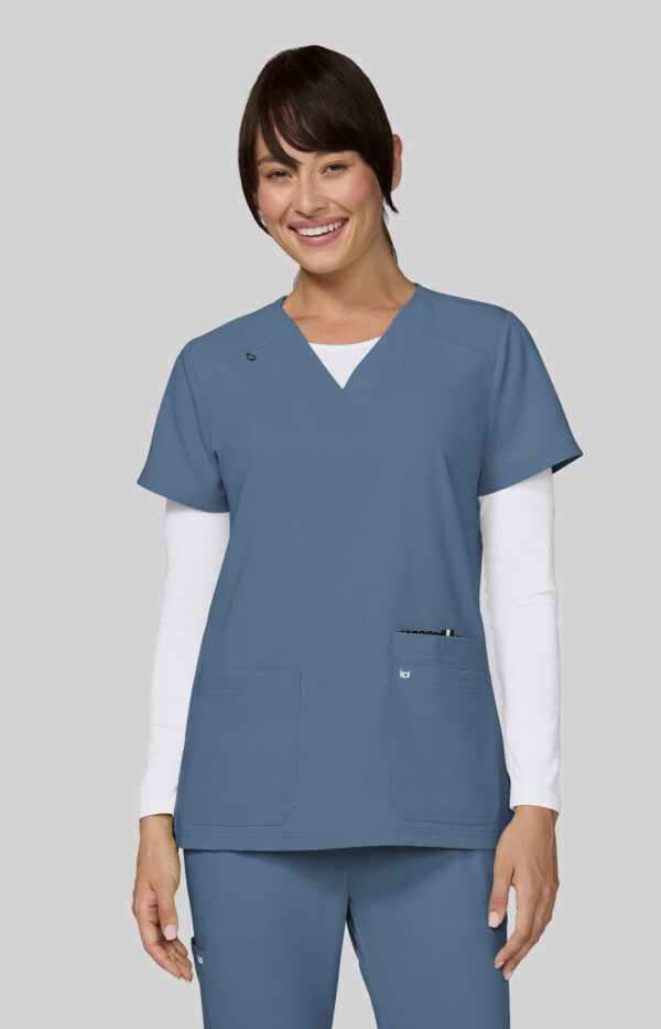 KOI Next Gen Women’s 3 Pocket Hustle and Heart V-Neck Scrub Top, 4-Way Stretch