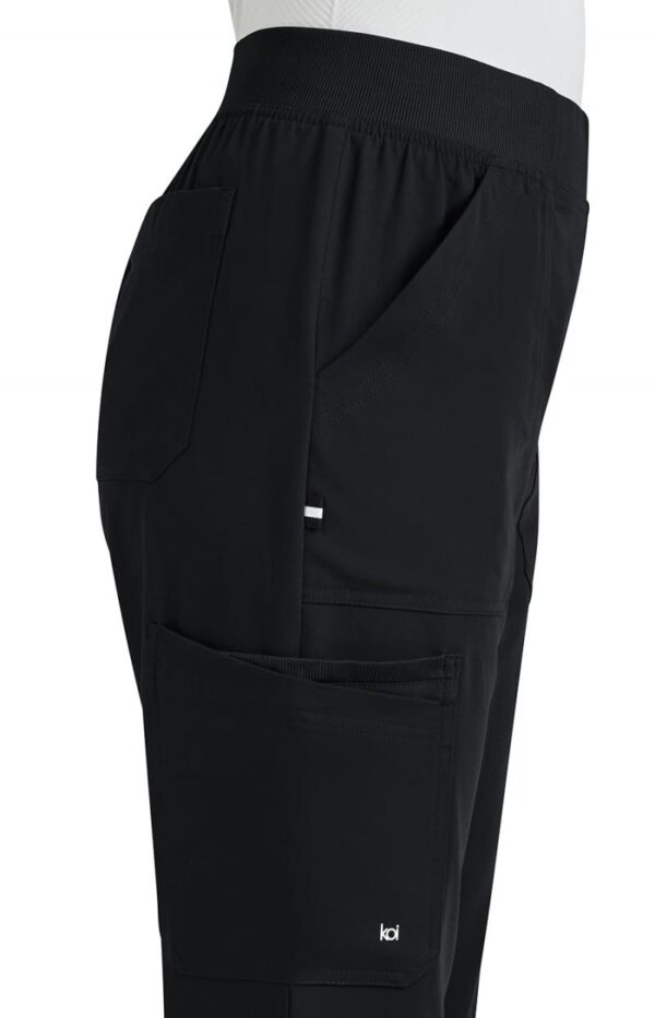 KOI Next Gen Jump Start Women's 7-Pocket Boot Cut Scrub Pant in Black product image