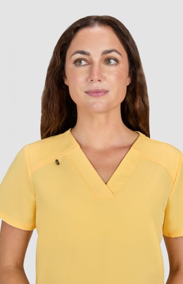 KOI Next Gen Women's 3 Pocket Hustle and Heart V-Neck Scrub Top, 4-Way Stretch in Royal Blue product image
