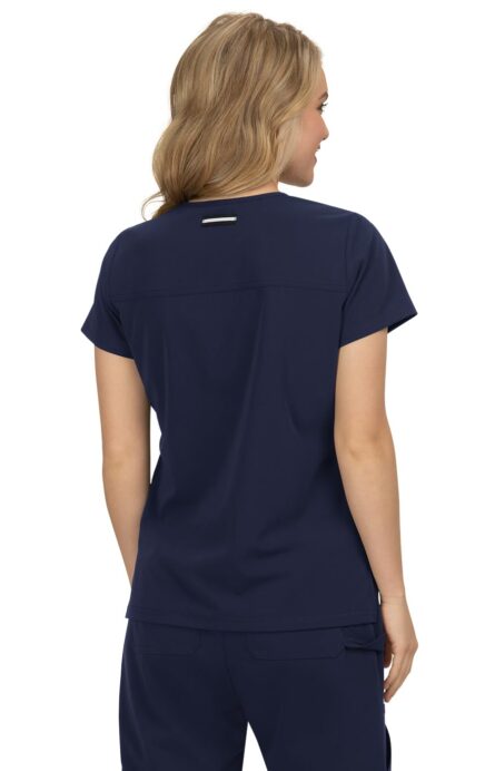 KOI Next Gen Women's 3 Pocket Hustle and Heart V-Neck Scrub Top, 4-Way Stretch in Navy product image