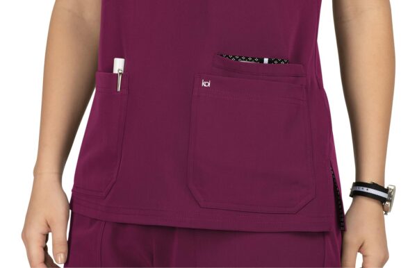 KOI Next Gen Women's 3 Pocket Hustle and Heart V-Neck Scrub Top, 4-Way Stretch in Wine product image