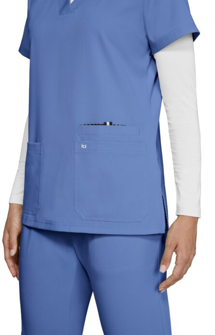 KOI Next Gen Women's 3 Pocket Hustle and Heart V-Neck Scrub Top, 4-Way Stretch in True Ceil product image