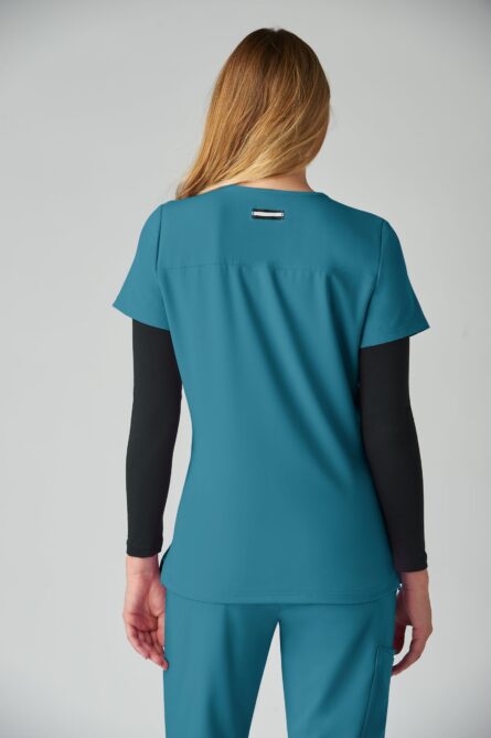 KOI Next Gen Women's 3 Pocket Hustle and Heart V-Neck Scrub Top, 4-Way Stretch in Teal product image
