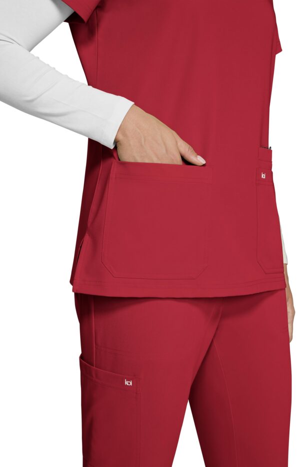 KOI Next Gen Women's 3 Pocket Hustle and Heart V-Neck Scrub Top, 4-Way Stretch in Ruby product image