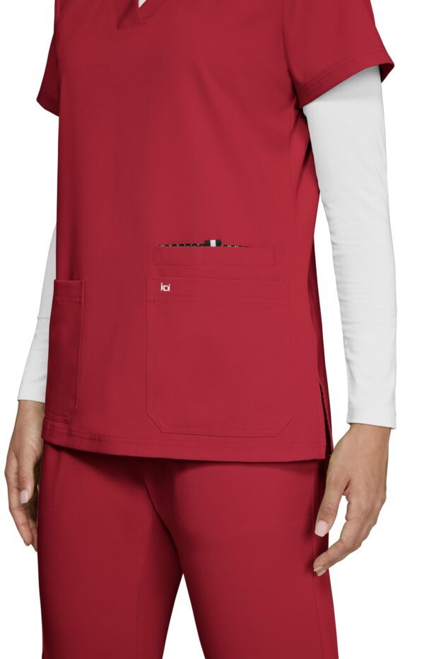 KOI Next Gen Women's 3 Pocket Hustle and Heart V-Neck Scrub Top, 4-Way Stretch in Ruby product image