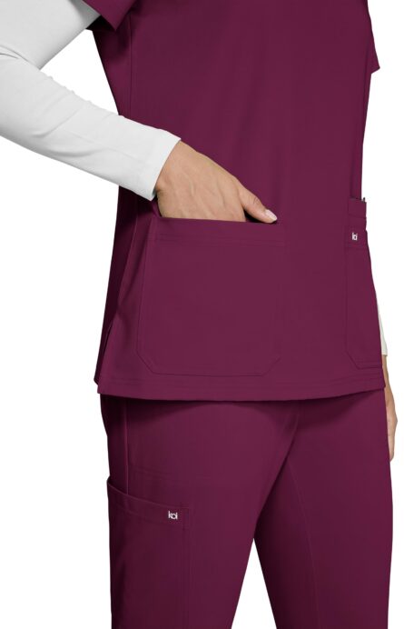KOI Next Gen Women's 3 Pocket Hustle and Heart V-Neck Scrub Top, 4-Way Stretch in Wine product image