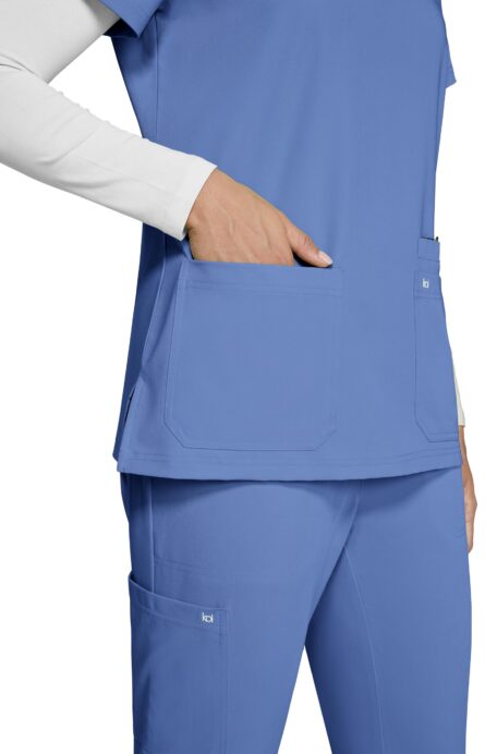 KOI Next Gen Women's 3 Pocket Hustle and Heart V-Neck Scrub Top, 4-Way Stretch in True Ceil product image