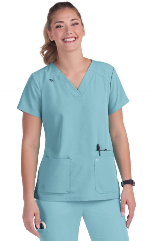 KOI Next Gen Women's 3 Pocket Hustle and Heart V-Neck Scrub Top, 4-Way Stretch in Sea Glass product image