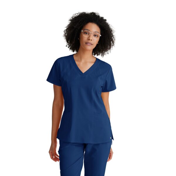 BARCO ONE – Women’s Racer Top, V-Neck Medical Scrub Top w/ 4 Pockets and 360 Spandex Stretch Fabric - Indigo BARCO ONE – Women’s Racer Top, V-Neck Medical Scrub Top w/ 4 Pockets and 360 Spandex Stretch Fabric in Indigo product image
