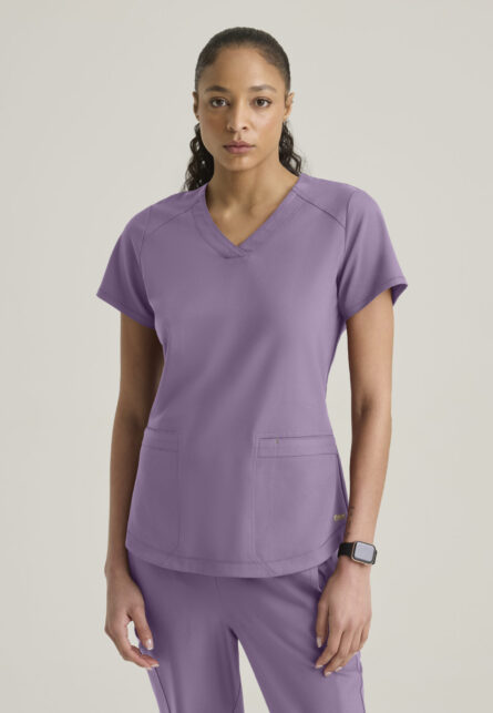 Grey's Anatomy Evolve 2 Pocket Piped V-Neck Top - Image 1